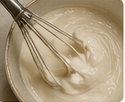 whipped buttercream in a mixing bowl